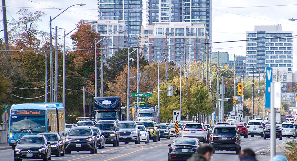 buses and cars in heavy traffic